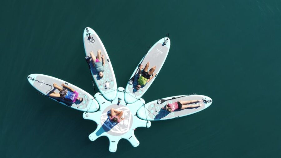 Arguineguín: Stand-up Paddleboard Yoga Class with Instructor - Paddling out to the SUP yoga dock station