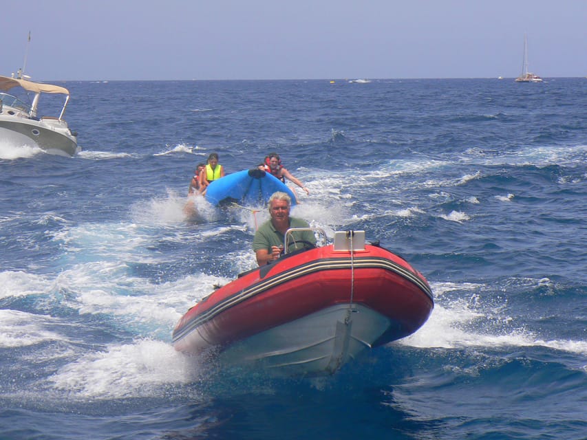 From Puerto Rico: Boat trip along the coast w/ Food & Drinks - The anchored bay stop: lunch, swim time, and underwater watching