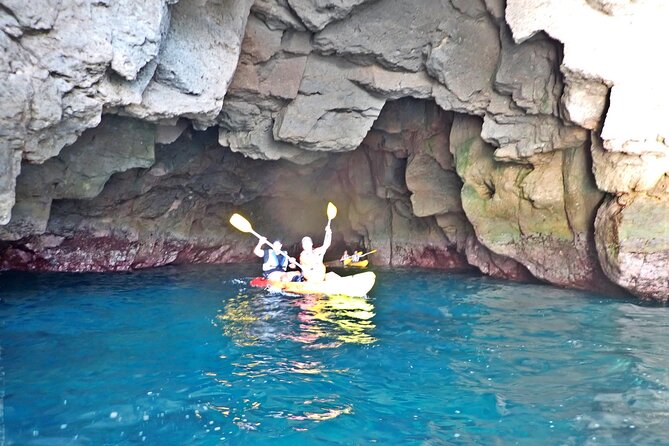 Kayak & Snorkeling Tour in Caves in Mogan - White cliffs and geology talk that actually connects to what you see