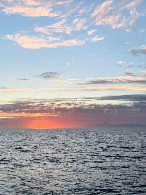 Maspalomas Sunset Sailing Experience - Sunset sailing in the cockpit and on the solarium