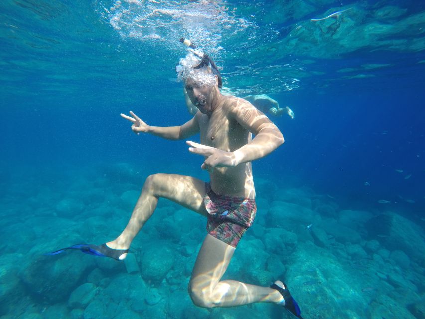 Puerto de Mogan: Boat and Snorkeling Trip - Cruising past Playa de Tasarte: the view stop that sets the tone