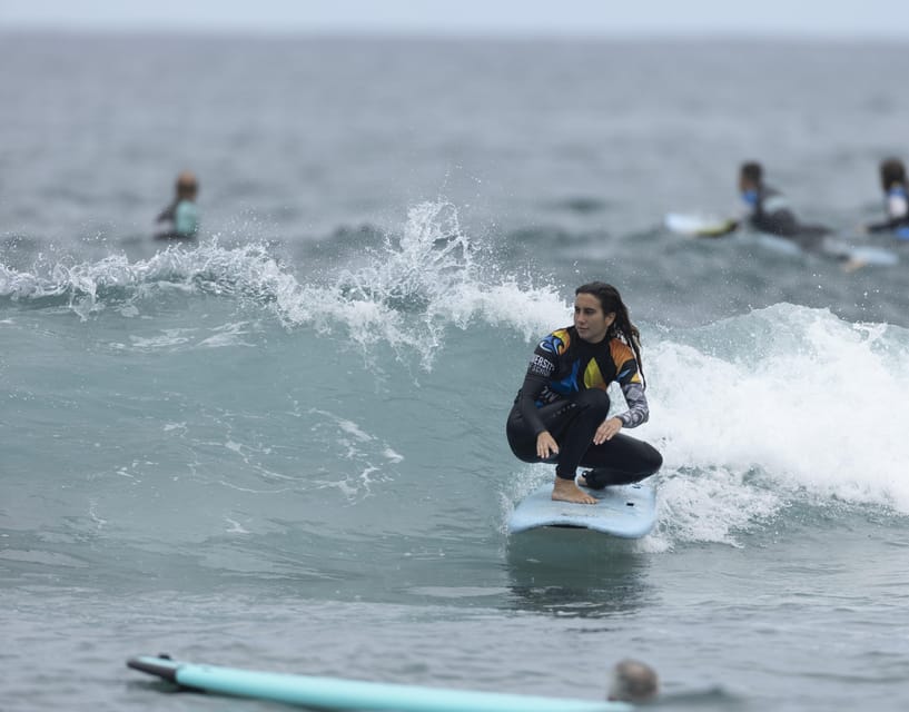 Surf lessons in Las Canteras Beach - Finding University Surf School on Playa de las Canteras